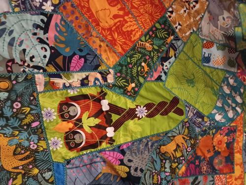 Patchwork of jungle print embroidery